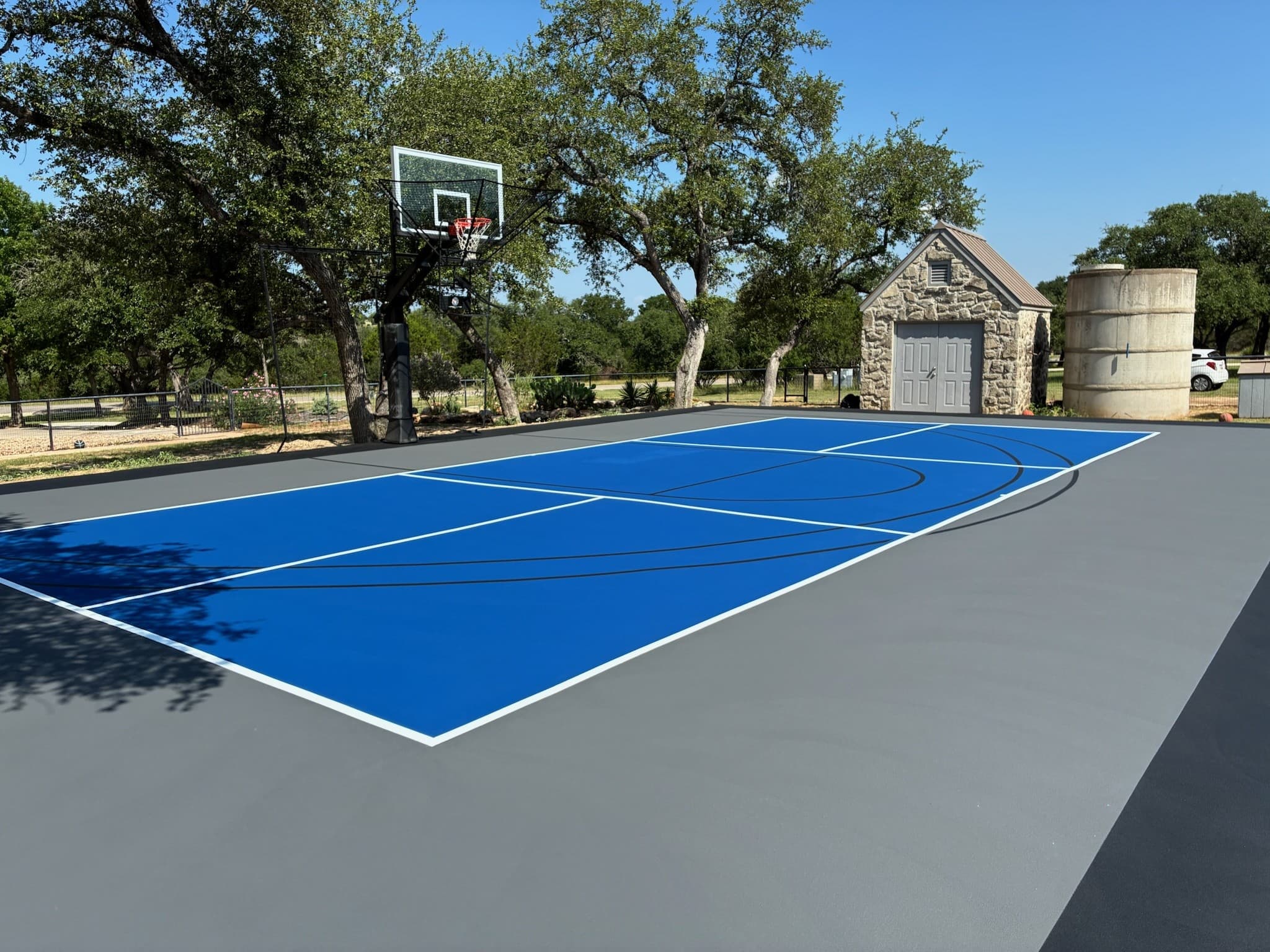 Full court with fence and lighting
