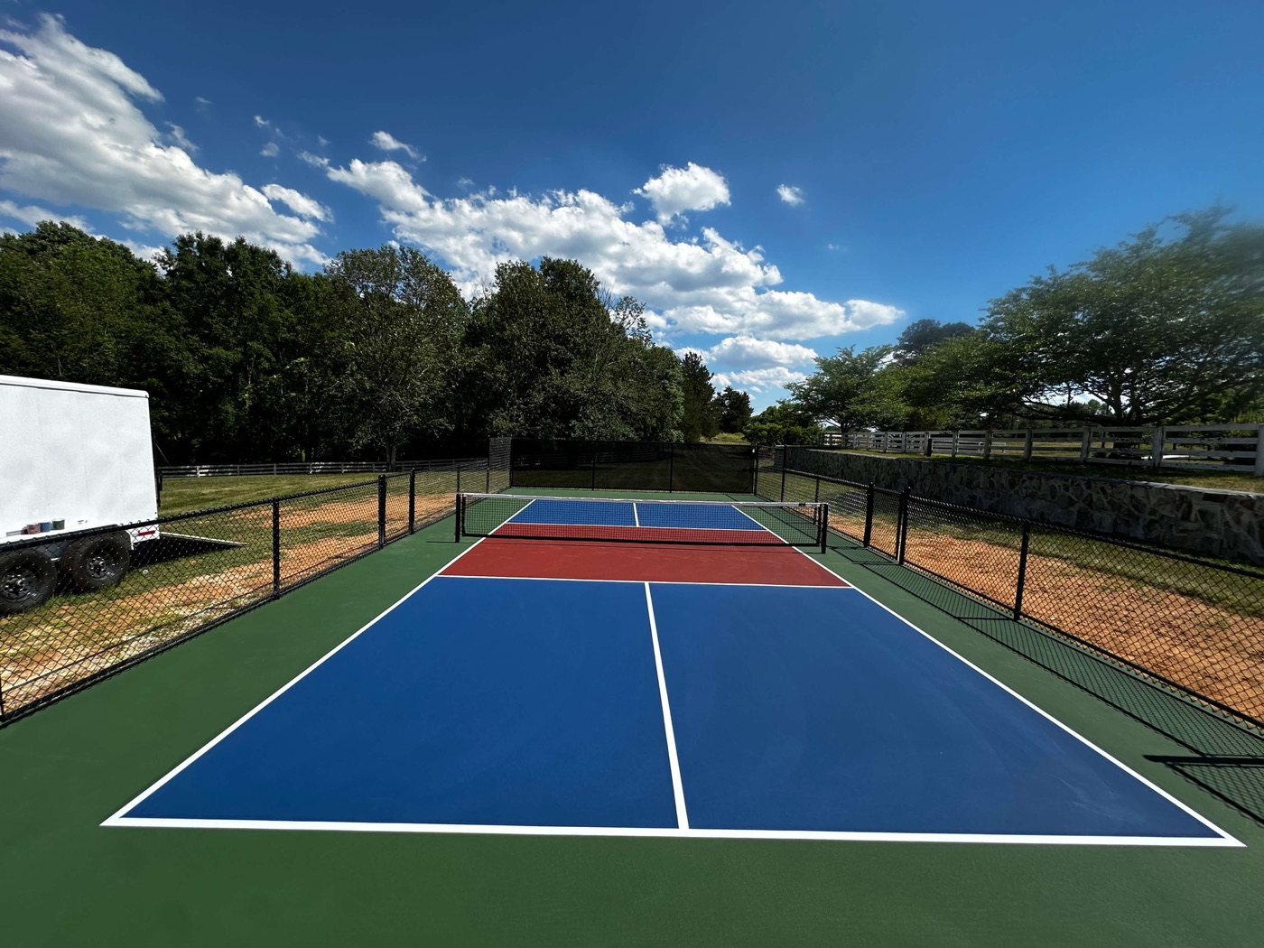 Backyard pickleball court built for a client in Greensboro, North Carolina.